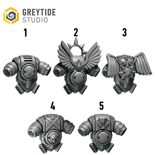 five different views of a futuristic-looking metallic object, possibly a weapon or armor piece, with wings and a skull-like design.